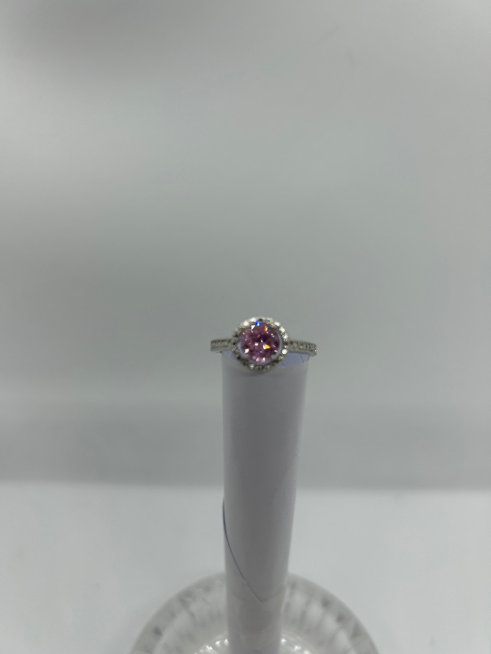 Ring with Pink Center Gemstone and Halo